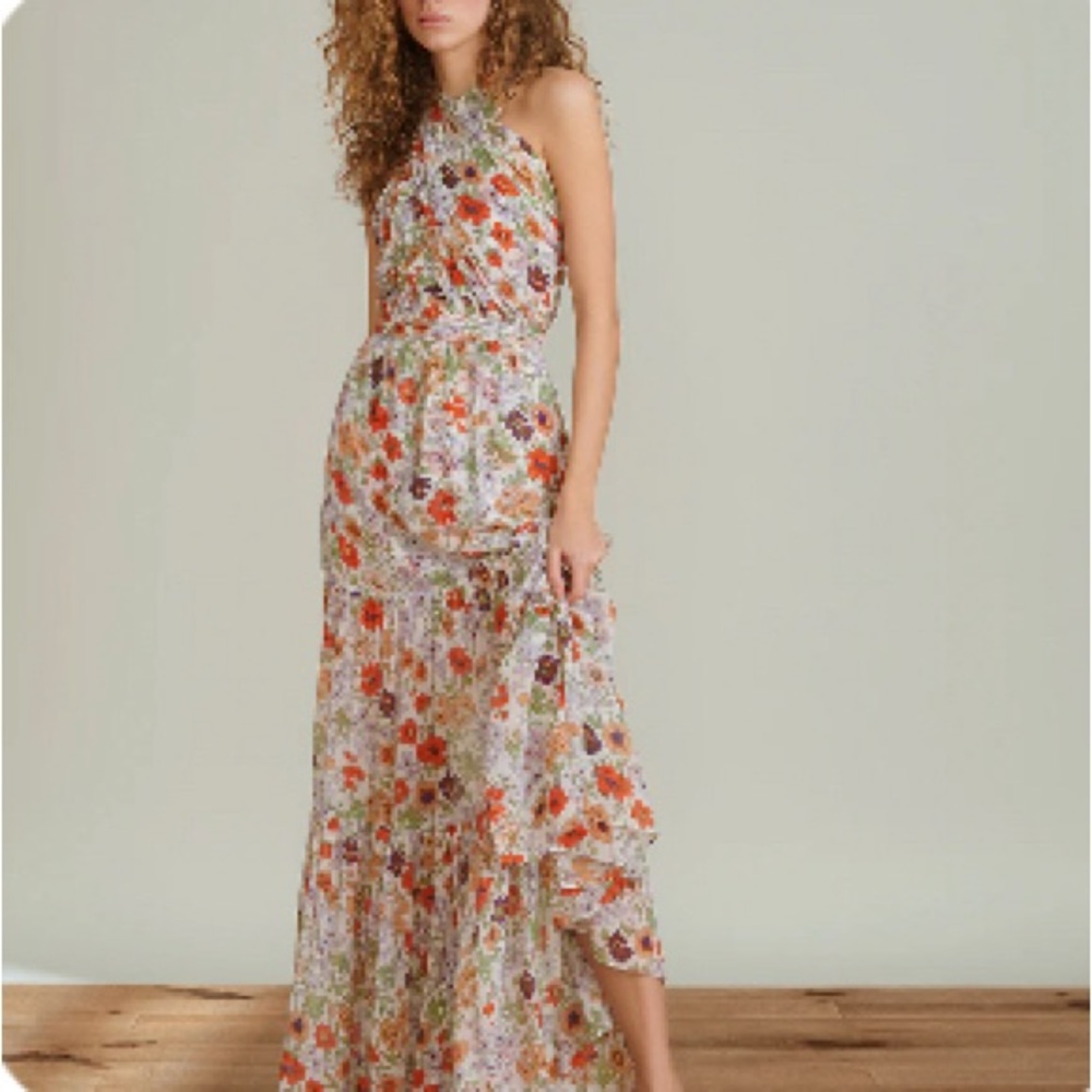 New With Tags. Never Worn - Purchased wrong size.